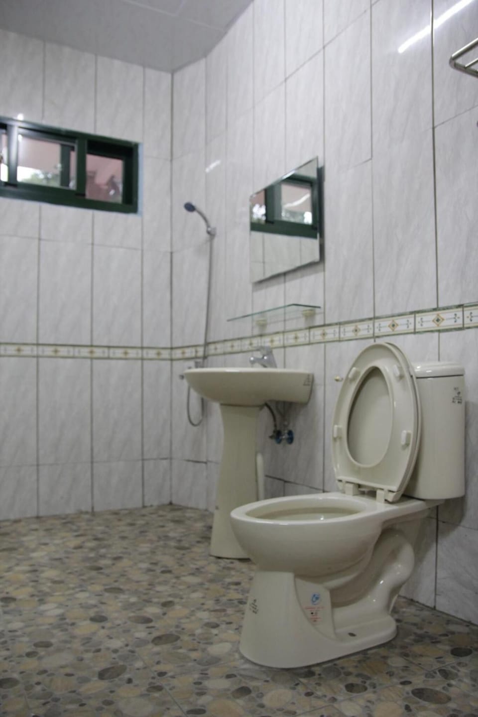 Shower, free toiletries, hair dryer, slippers