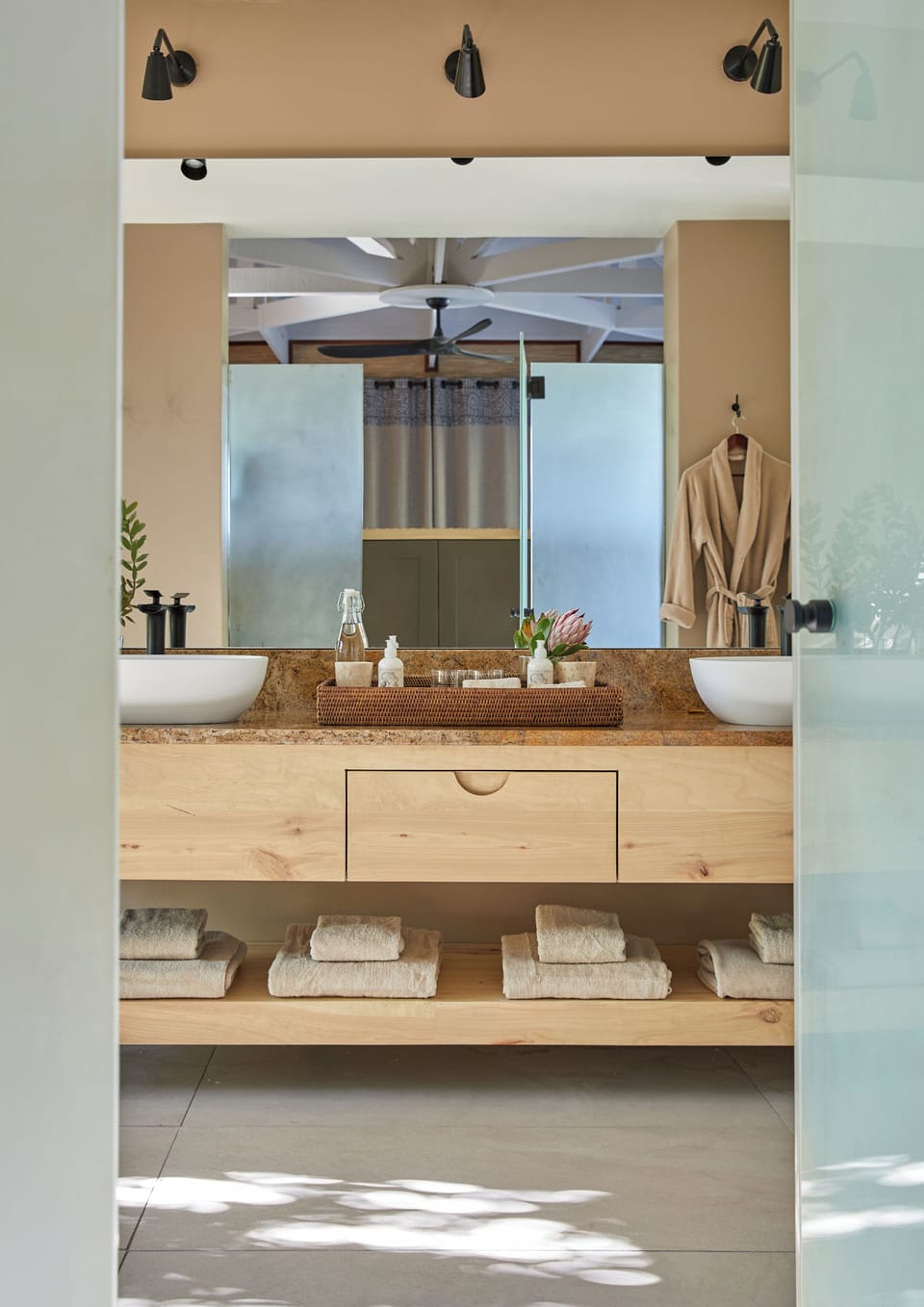Separate tub and shower, hair dryer, slippers, towels