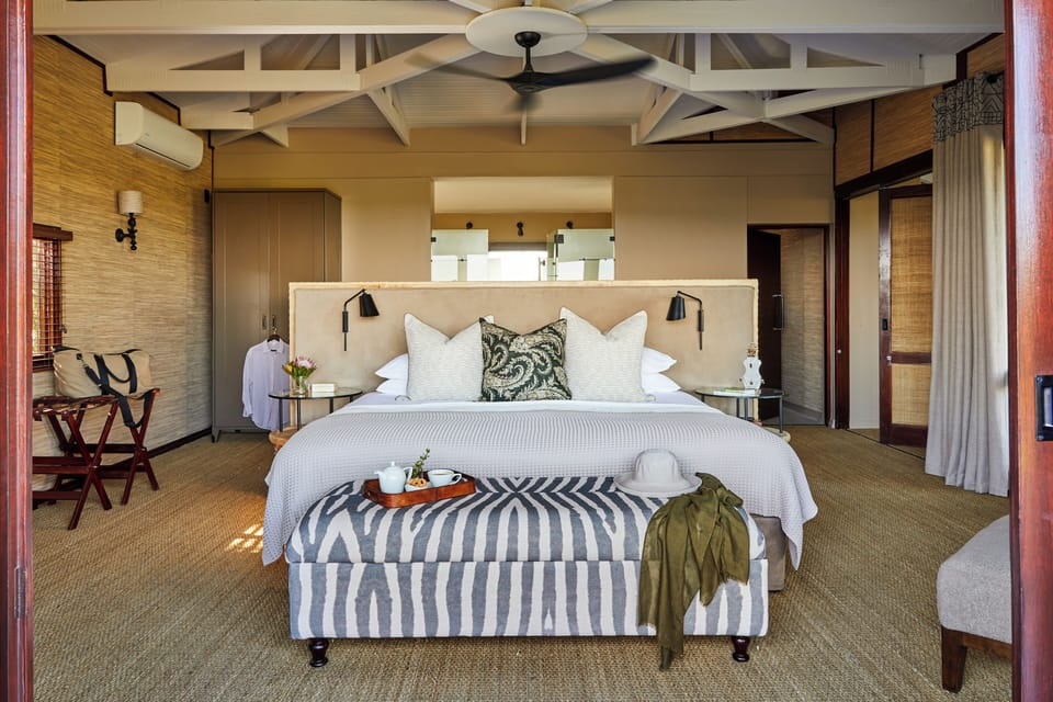 Family Quadruple Room | Minibar (free items), in-room safe, bed sheets