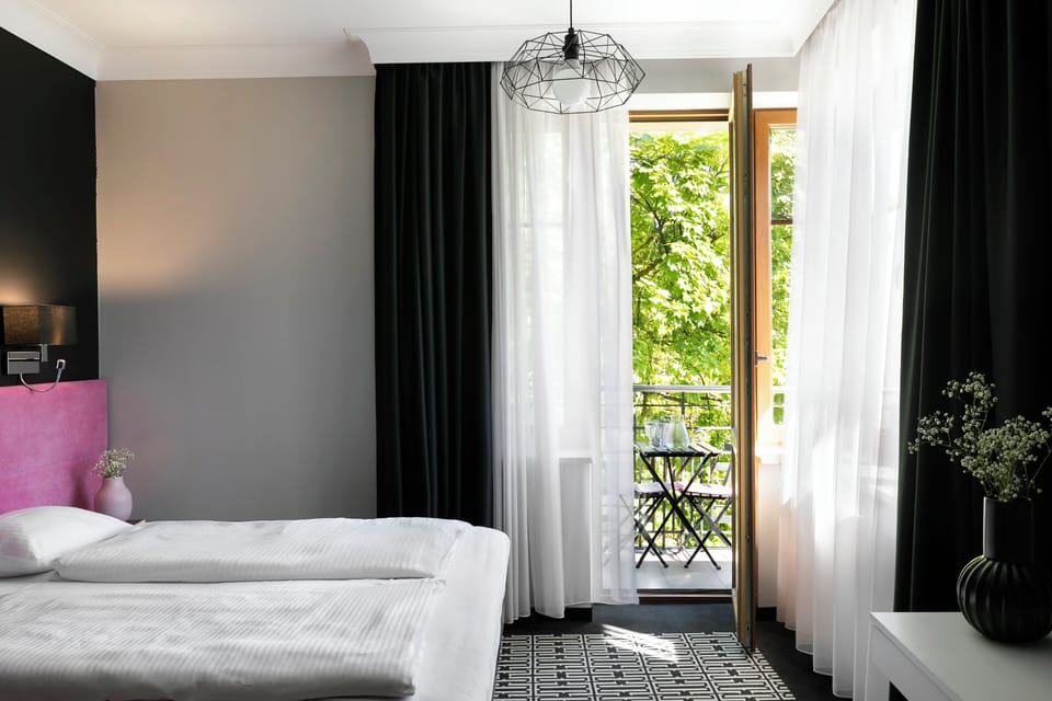 Superior Double or Twin Room | Minibar, in-room safe, individually decorated, desk