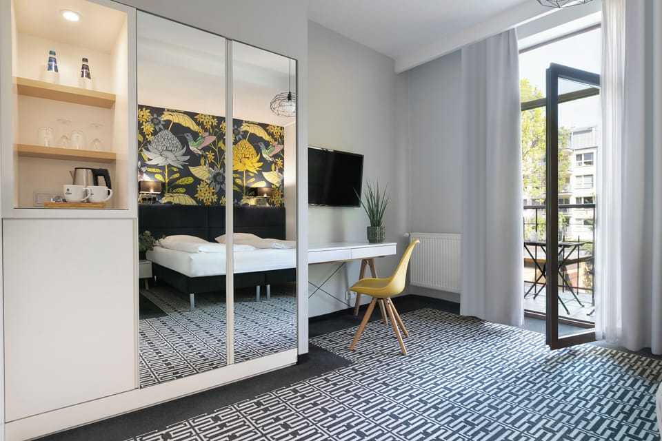Double or Twin Room | Minibar, in-room safe, individually decorated, desk