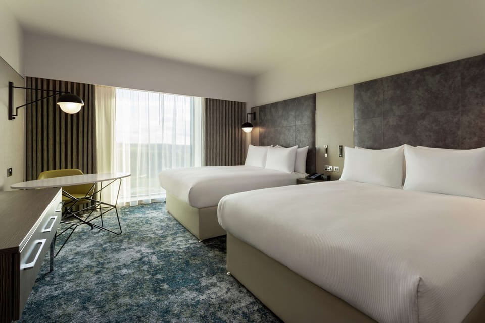 Premium bedding, pillowtop beds, minibar, in-room safe