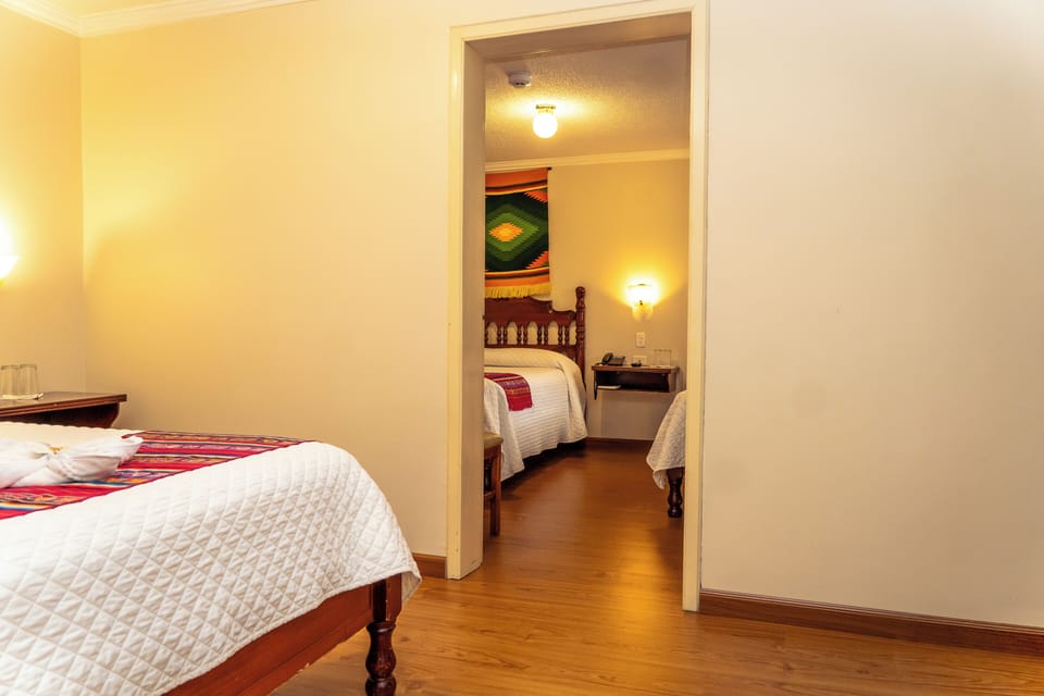 Standard Triple Room, Non Smoking, Courtyard View | In-room safe, blackout drapes, WiFi (free), bed sheets