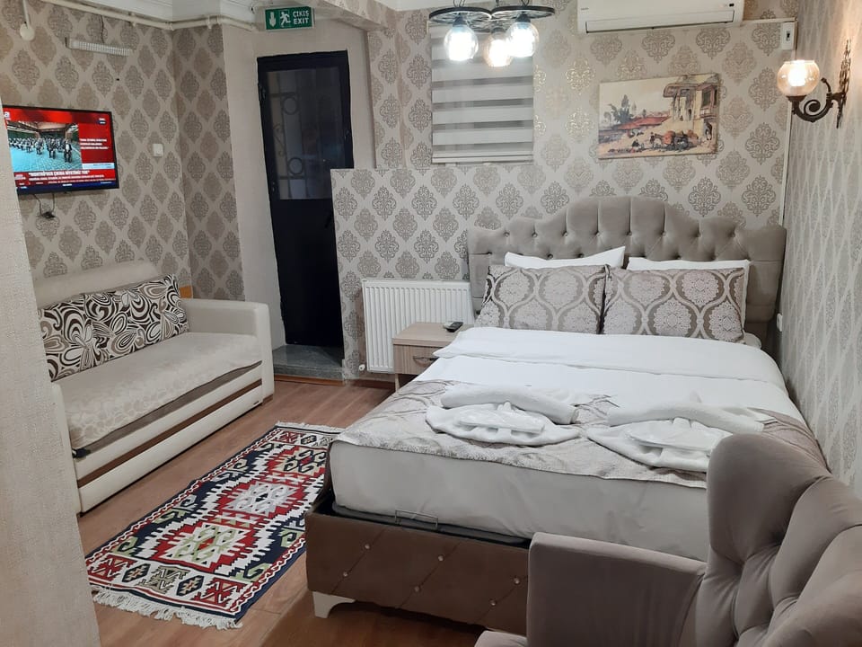 Family Triple Room, Basemant Floor | WiFi (free), bed sheets
