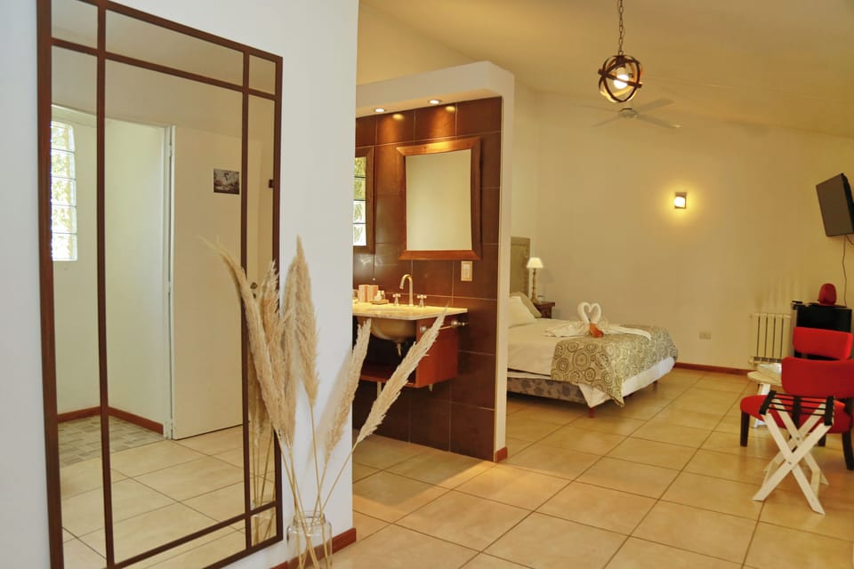 Superior Room | Minibar, in-room safe, individually decorated, individually furnished