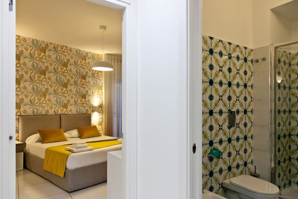 Apartment, 1 Queen Bed | Bathroom | Shower, rainfall showerhead, free toiletries, hair dryer