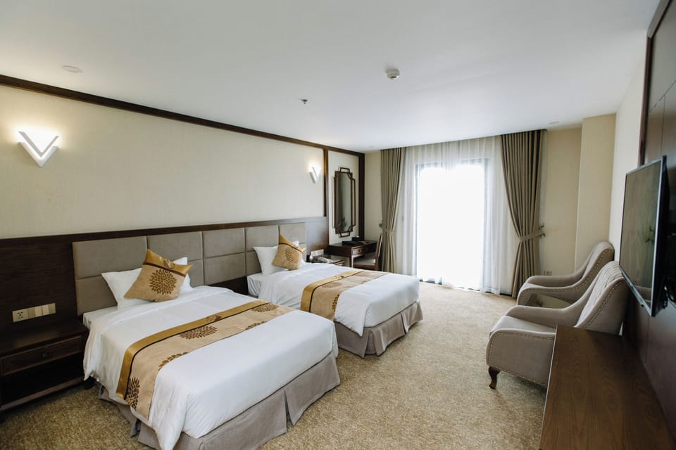 Deluxe Twin Room, Balcony, Hill View | Minibar, in-room safe, desk, blackout drapes