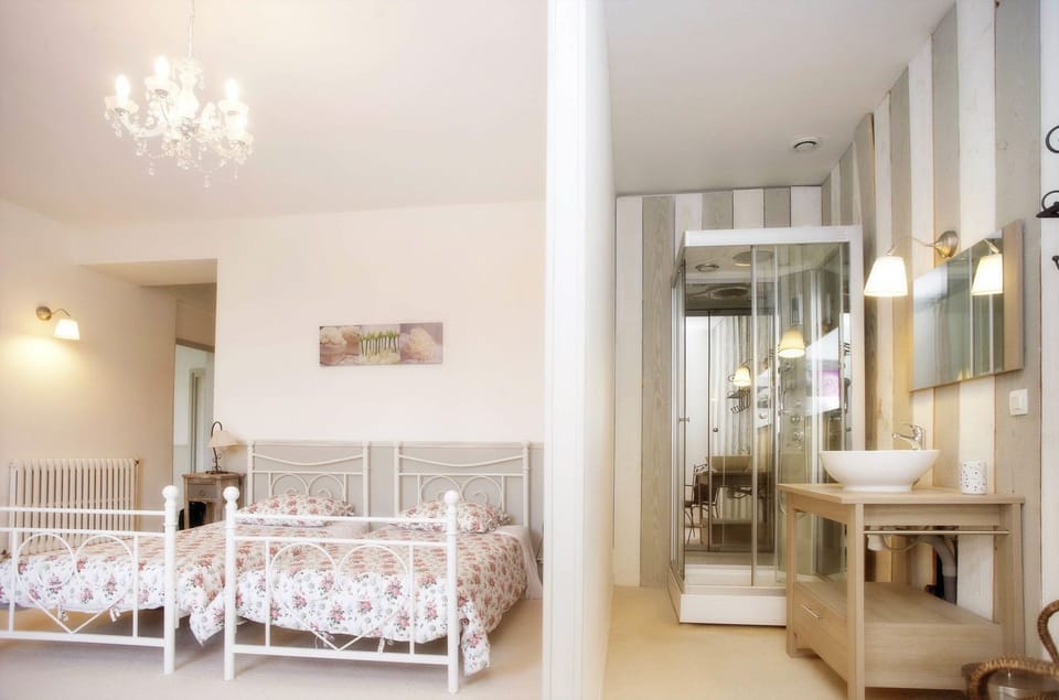 Royal Suite, Garden View | Down comforters, memory foam beds, individually decorated