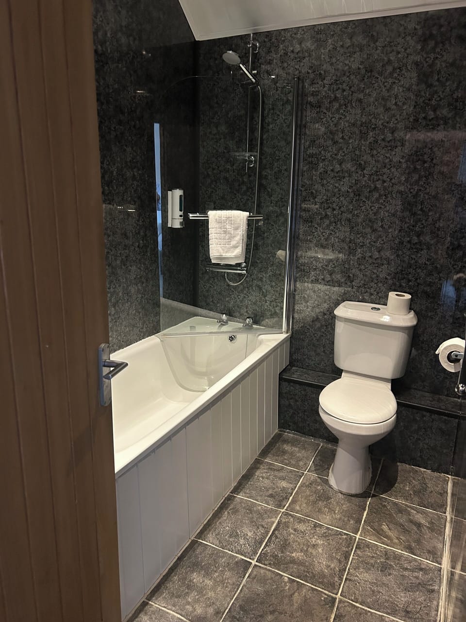 Family room for 3 | Bathroom | Deep soaking tub, free toiletries, hair dryer, towels