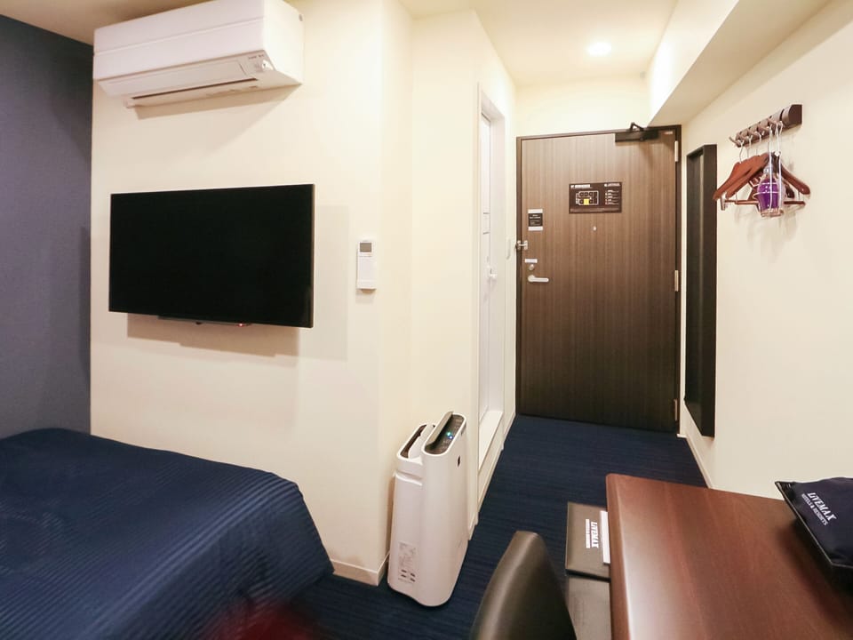 Desk, blackout drapes, free WiFi, bed sheets