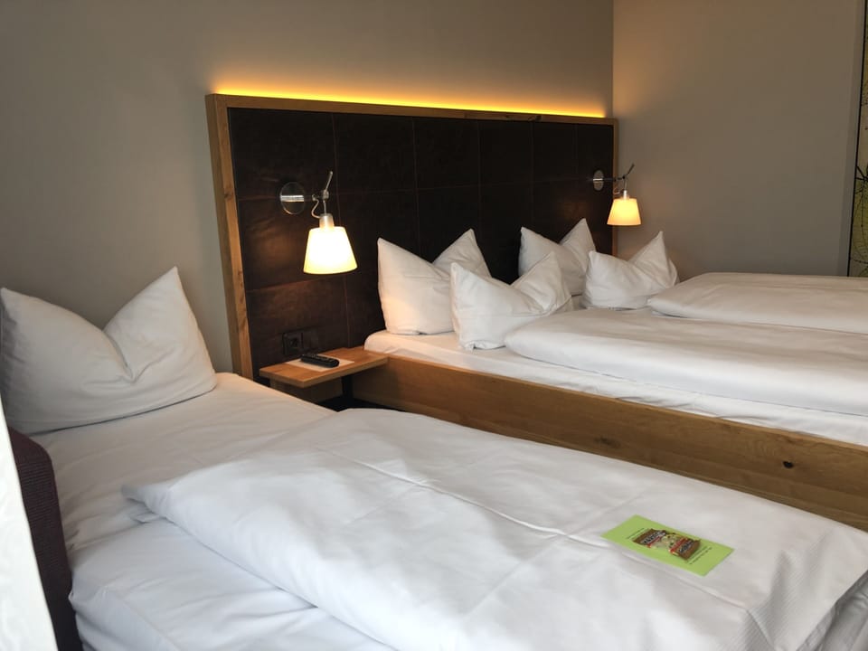 Standard Triple Room | Minibar, in-room safe, desk, blackout drapes