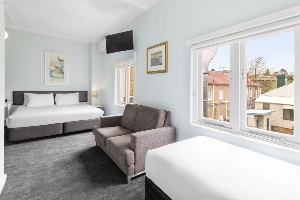 Family Room, 1 Double and 2 Single Beds | Iron/ironing board (on request), bed sheets
