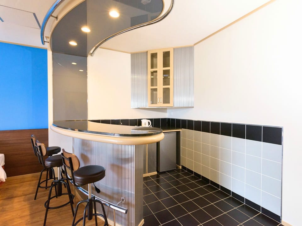 Deluxe Room, Non Smoking | Desk, laptop workspace, soundproofing, iron/ironing board (on request)