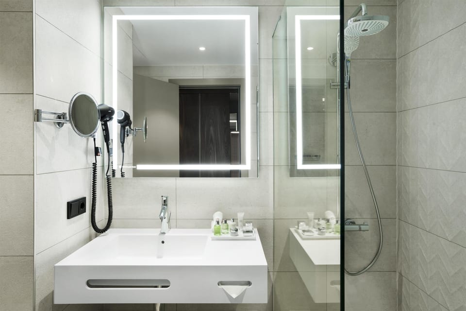Shower, rainfall showerhead, eco-friendly toiletries, hair dryer