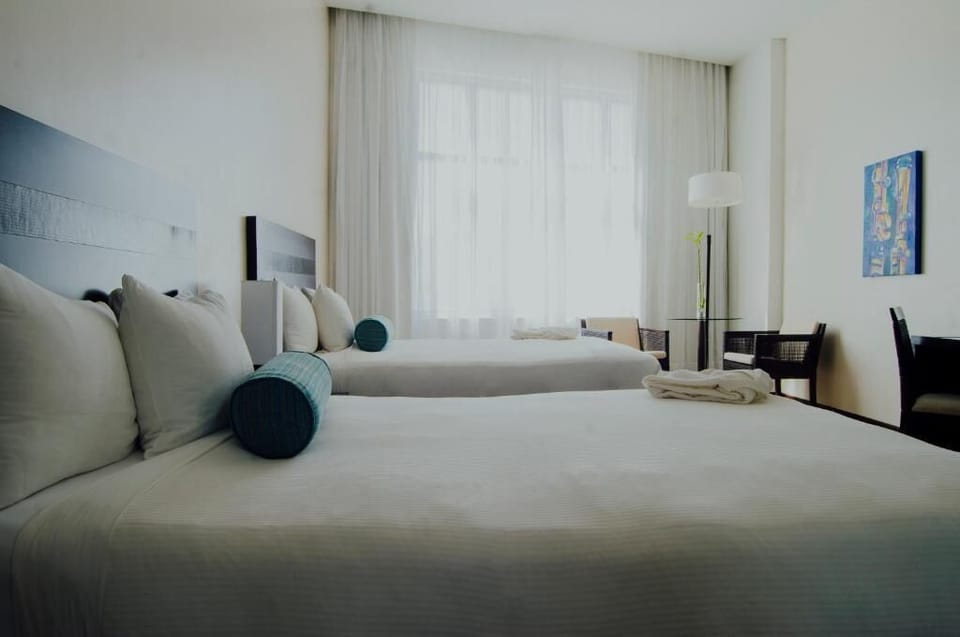 Classic Double Room, 2 Queen Beds, City View | In-room safe, desk, laptop workspace, WiFi (free)