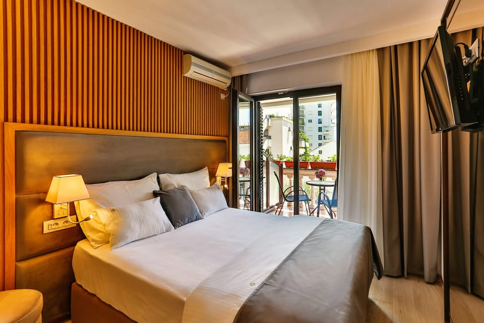 Family Quadruple Room, Multiple Beds, Non Smoking, City View | Minibar, in-room safe, blackout drapes, soundproofing