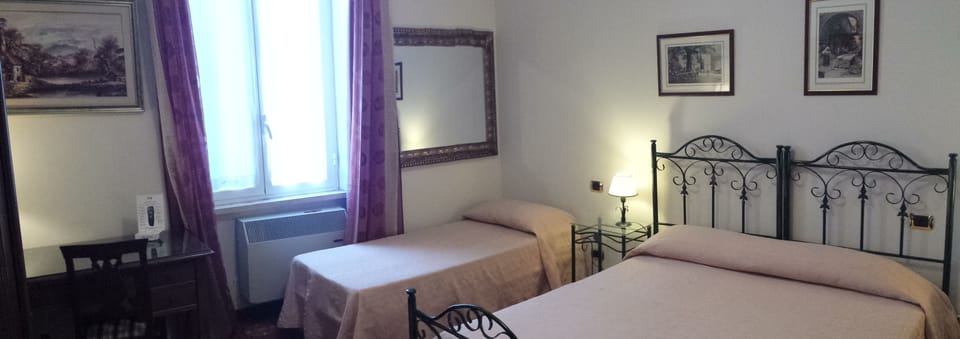 Superior Triple Room, Non Smoking | In-room safe, desk, blackout drapes, rollaway beds