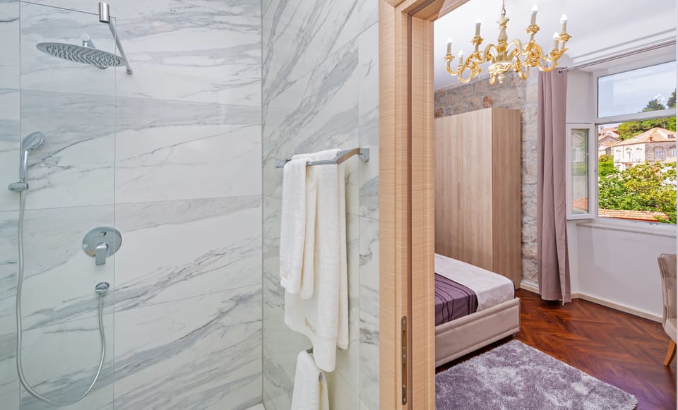 Deluxe Double Room, Sea View | Individually decorated, individually furnished, desk, iron/ironing board