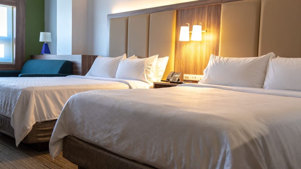 Suite, Multiple Beds | In-room safe, desk, laptop workspace, blackout drapes