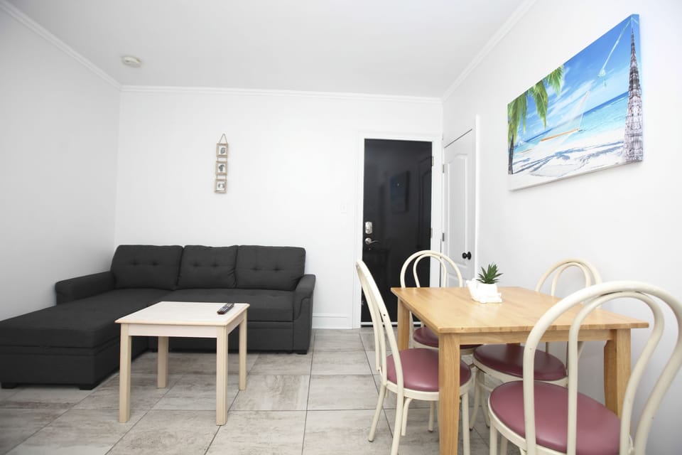Apartment, 1 Bedroom, Non Smoking (East Side) | Living area | LED TV
