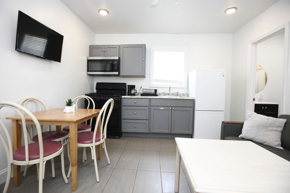 Apartment, 2 Bedrooms, Non Smoking (Ocean Side) | Private kitchen | Full-size fridge, microwave, oven, stovetop