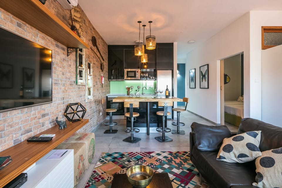 Family Apartment, 1 Bedroom, City View | Living room | 42-inch flat-screen TV with cable channels, TV