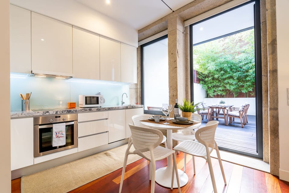 Family Apartment, Terrace | Living area | 32-inch flat-screen TV with cable channels, TV