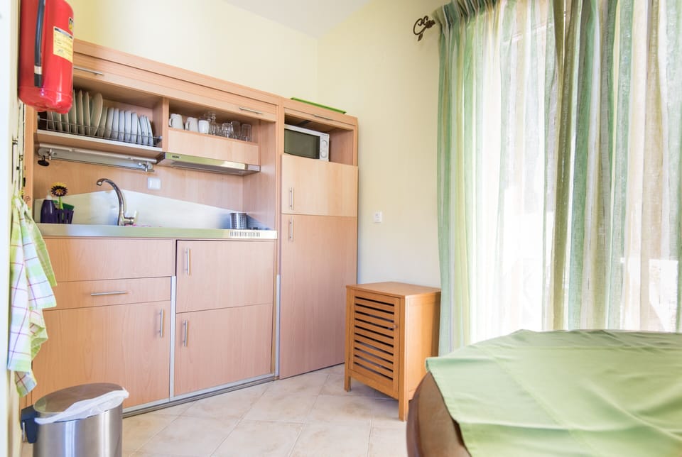 Premium Apartment (Portha) | Private kitchen | Espresso maker, coffee/tea maker, electric kettle, highchair