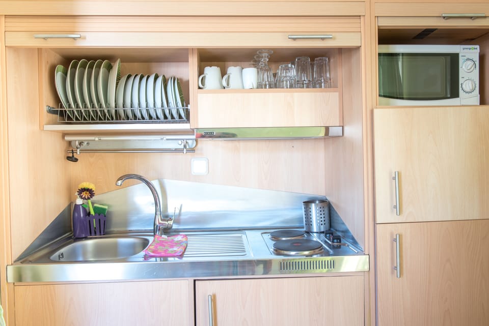 Premium Apartment (Portha) | Private kitchen | Espresso maker, coffee/tea maker, electric kettle, highchair