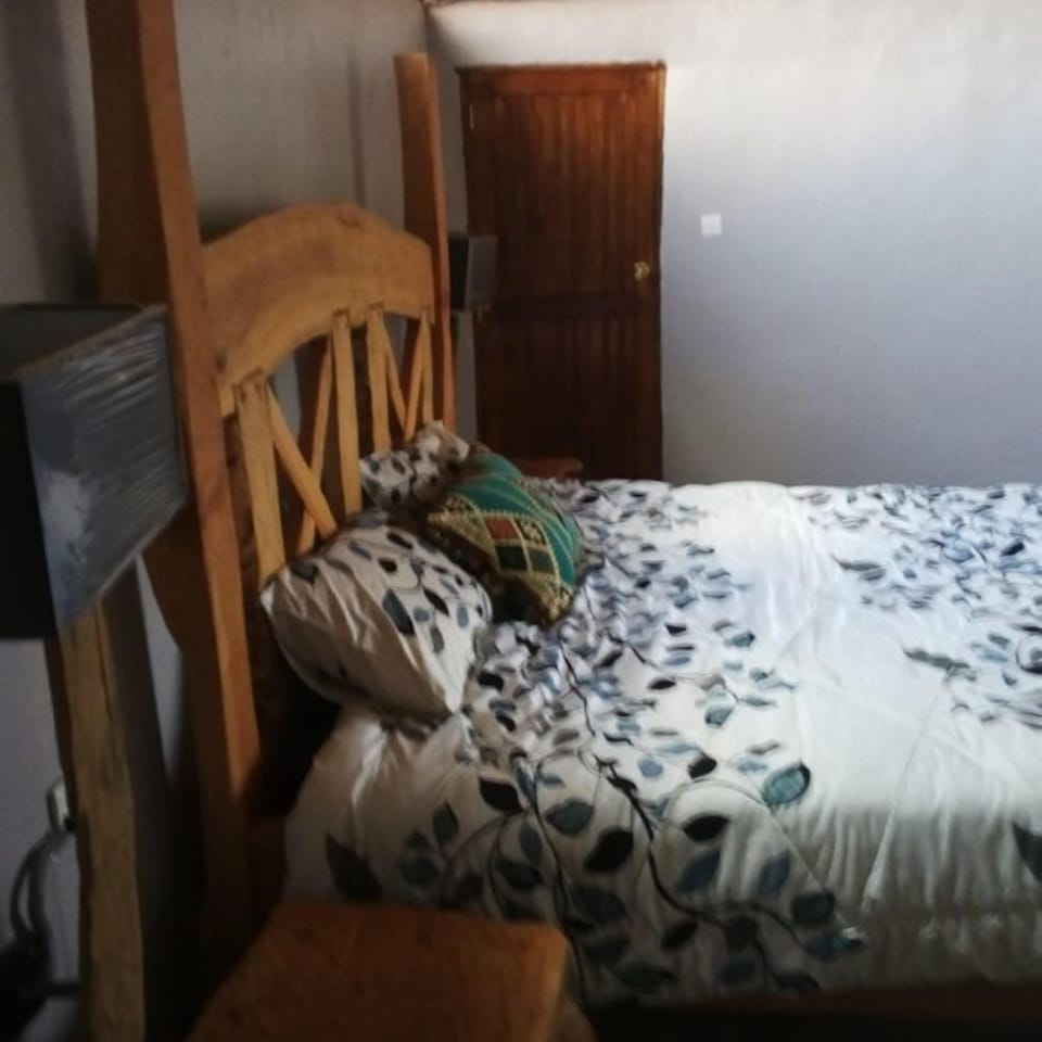 Family Room, Garden View | Desk, bed sheets