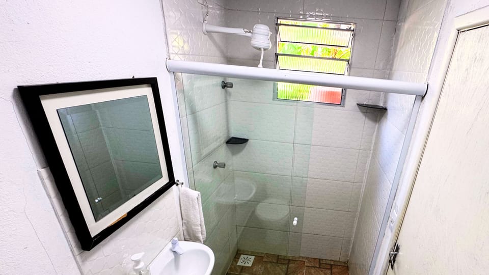 Quadruple Room | Bathroom | Shower, hair dryer, towels, soap
