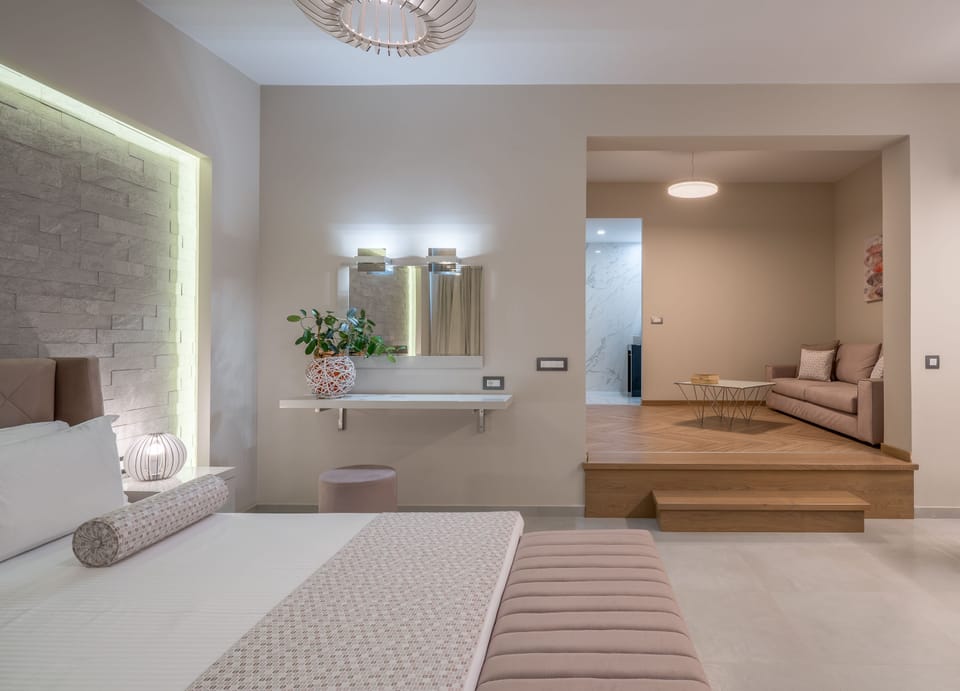 Executive Double Room | Living area | 32-inch flat-screen TV with satellite channels