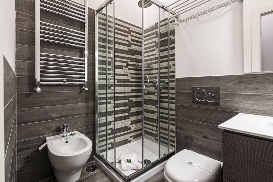 Family Loft, City View | Bathroom | Shower, rainfall showerhead, hair dryer, bidet