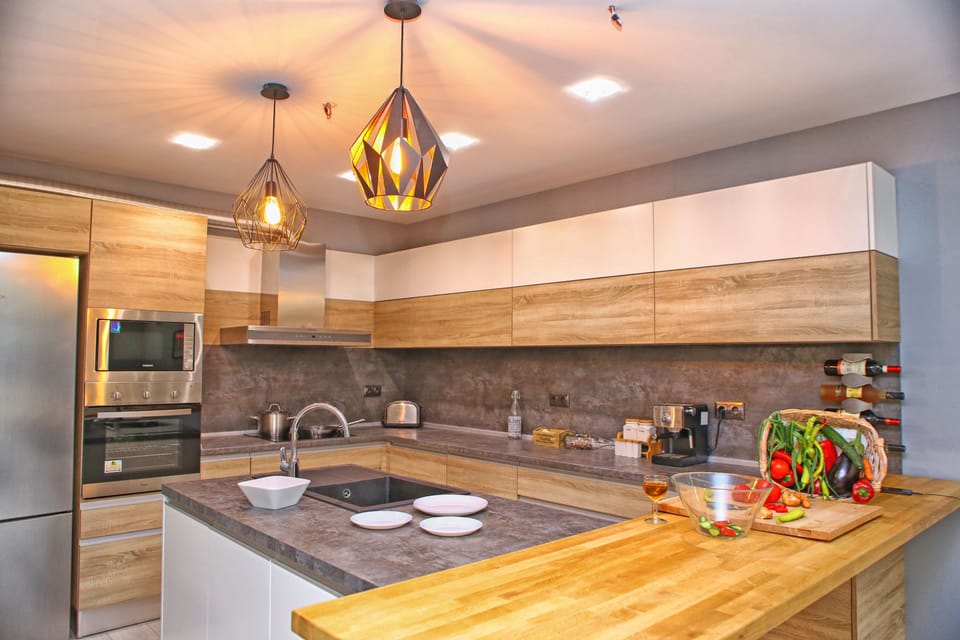 Luxury Villa, Balcony, Pool View | Private kitchen | Coffee/tea maker, full-size fridge, microwave, oven