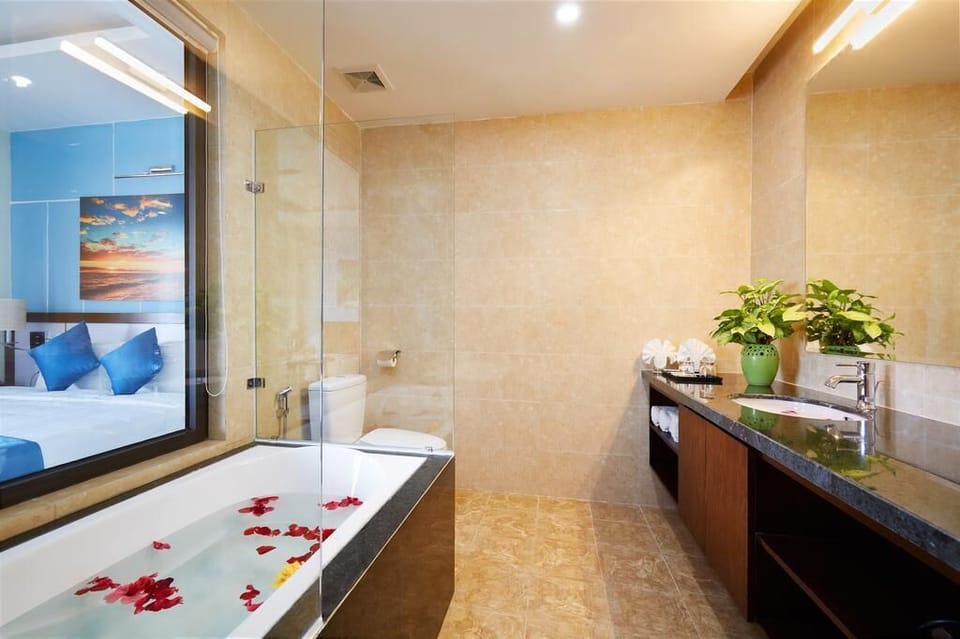 Shower, free toiletries, hair dryer, slippers
