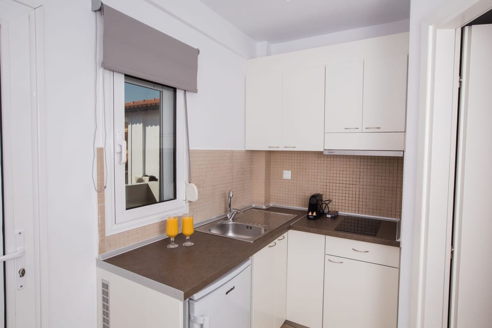 Standard Apartment | Private kitchenette | Fridge, stovetop, espresso maker, electric kettle