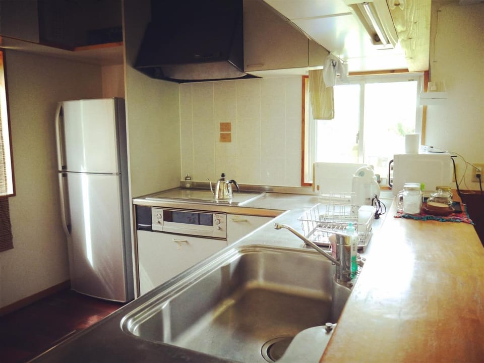 Full-size fridge, microwave, stovetop, electric kettle