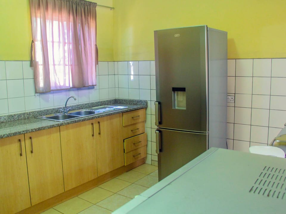 Fridge, microwave, cookware/dishes/utensils