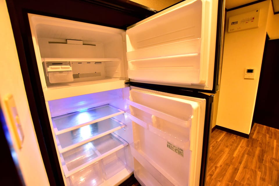 Japanese Style Townhouse | Private kitchenette | Fridge, microwave, cookware/dishes/utensils