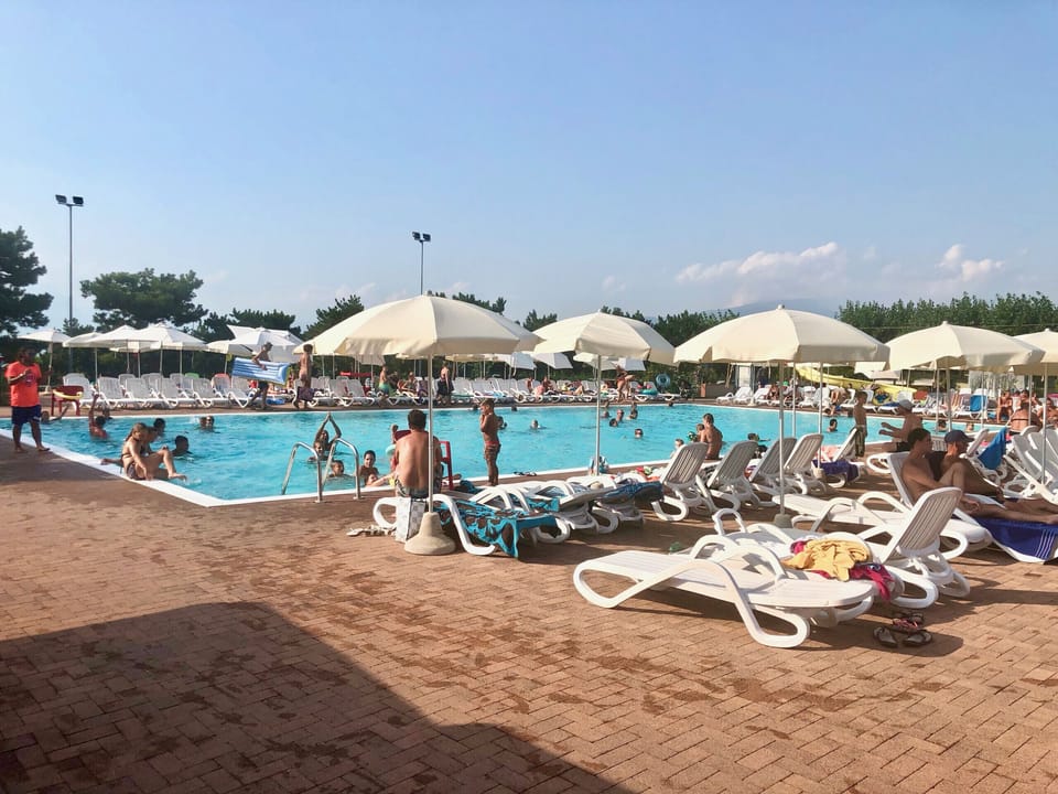 Seasonal outdoor pool, pool umbrellas, sun loungers
