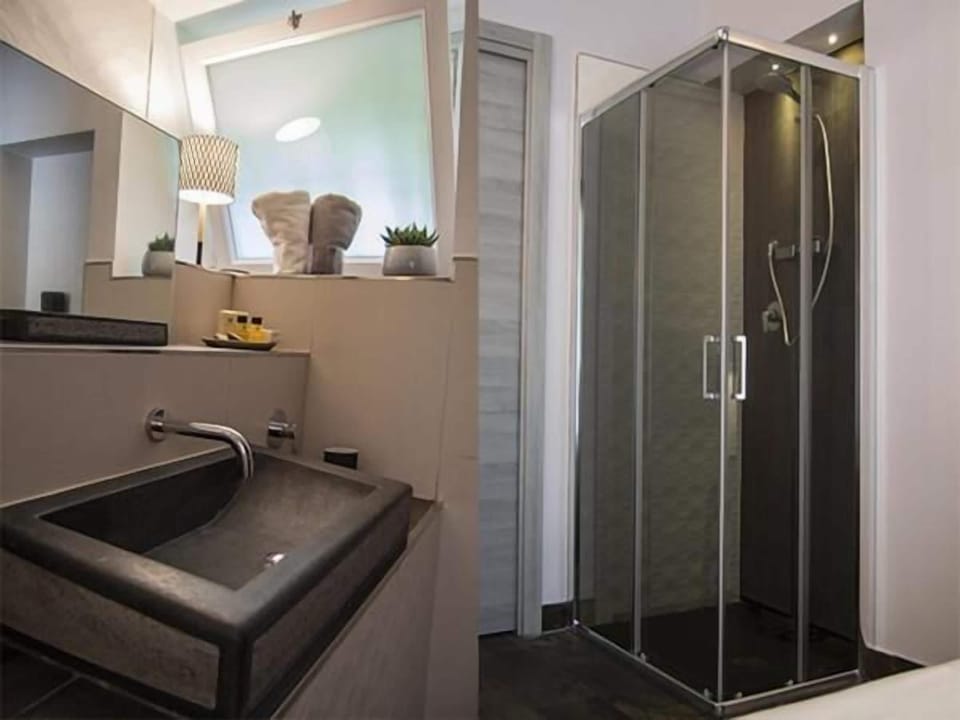 Shower, free toiletries, hair dryer, bathrobes