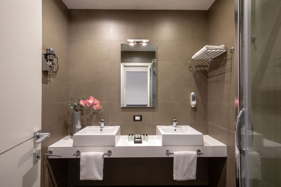 Family Room, 2 Bedrooms, Connecting Rooms | Bathroom | Shower, rainfall showerhead, free toiletries, hair dryer