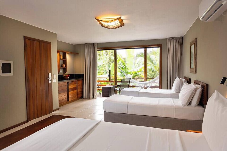 Deluxe Room | In-room safe, blackout drapes, WiFi (free), bed sheets