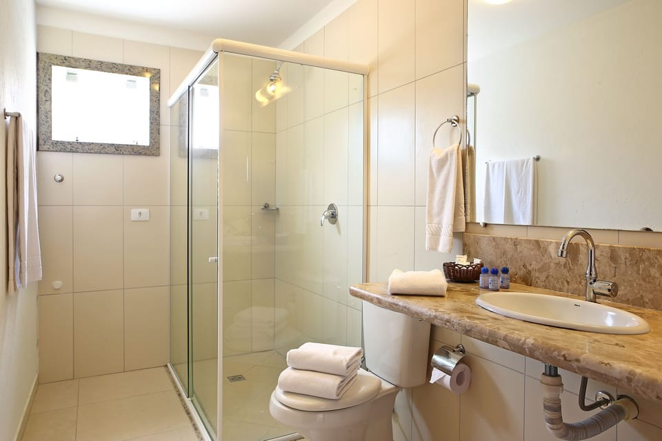 Shower, free toiletries, hair dryer, towels