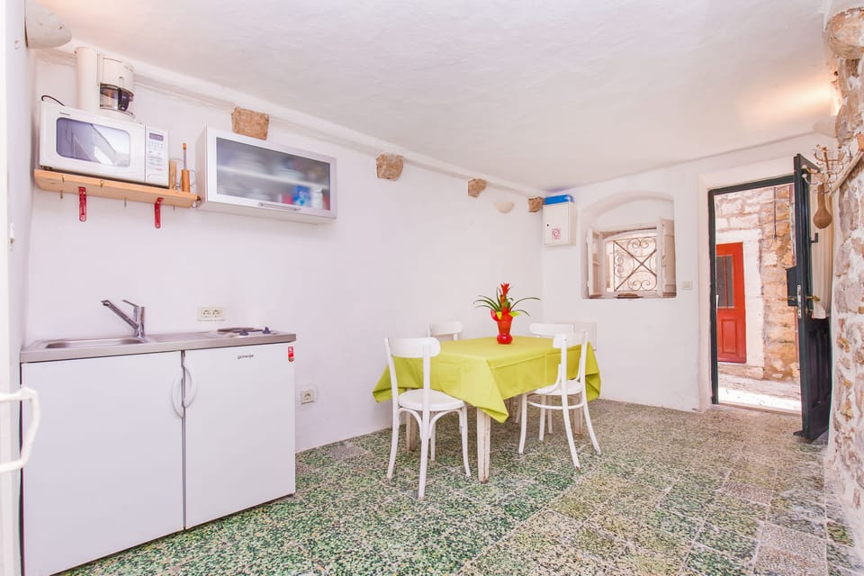 Classic Apartment, 2 Bedrooms | Private kitchen | Fridge, microwave, stovetop, coffee/tea maker