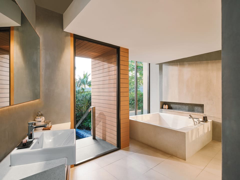 Duplex Grand Pool Villa | Bathroom | Separate tub and shower, rainfall showerhead, free toiletries