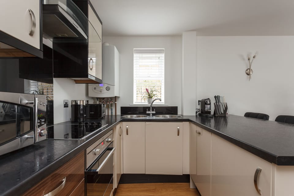Superior Apartment, Multiple Beds | Private kitchen | Full-size fridge, microwave, oven, dishwasher