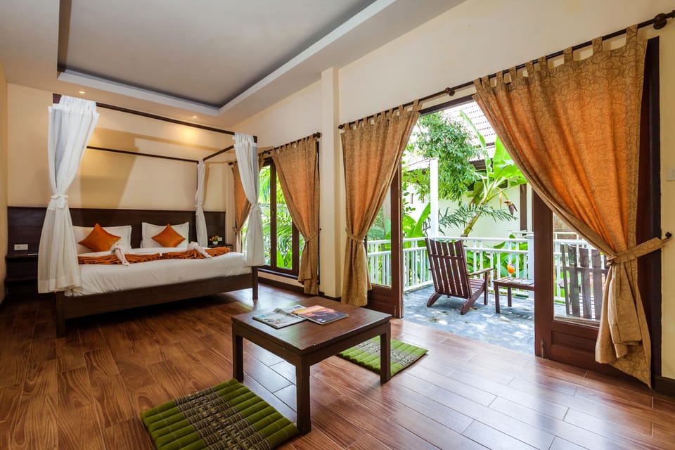 Deluxe Bungalow, Garden View | Minibar, in-room safe, desk, free WiFi