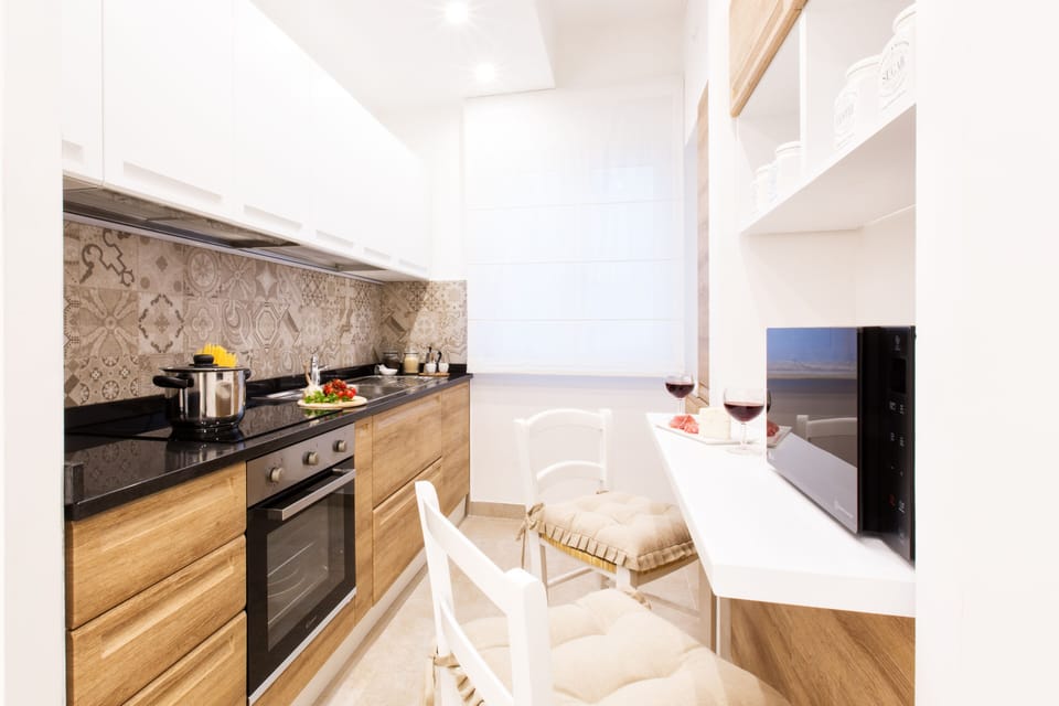 Apartment, 2 Bedrooms | Private kitchen | Coffee/tea maker, electric kettle, toaster oven, spices