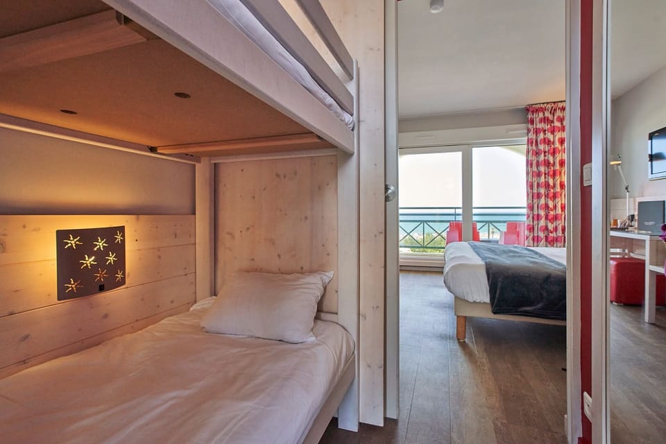 Quadruple Room, Ocean View | In-room safe, desk, free cribs/infant beds, free WiFi